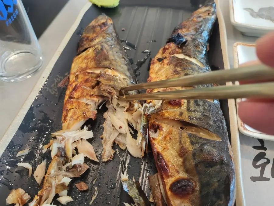 Full table set with clay-oven grilled mackerel
