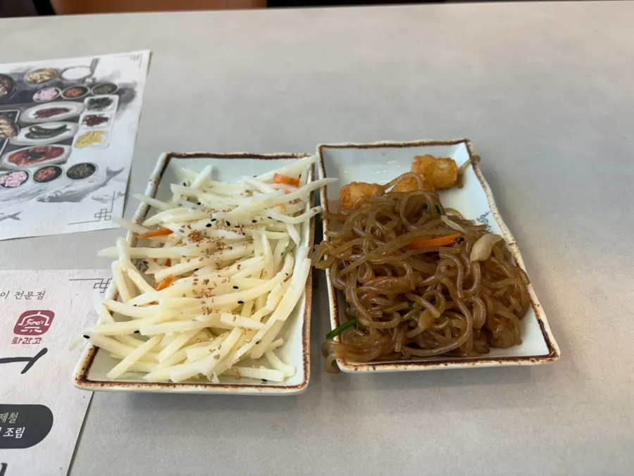 A meal of warm rice and grilled fish