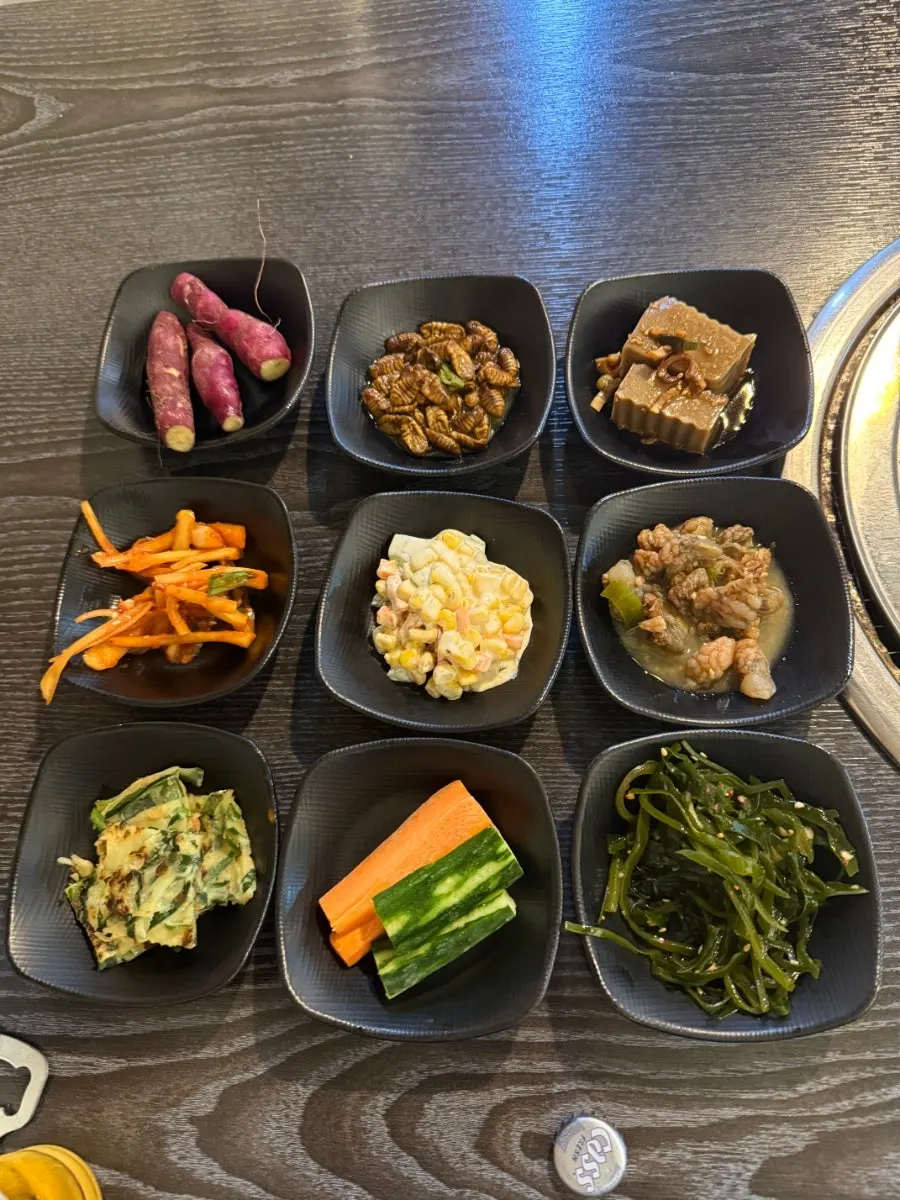 Table pre-set with chojang sauce and a shot glass
