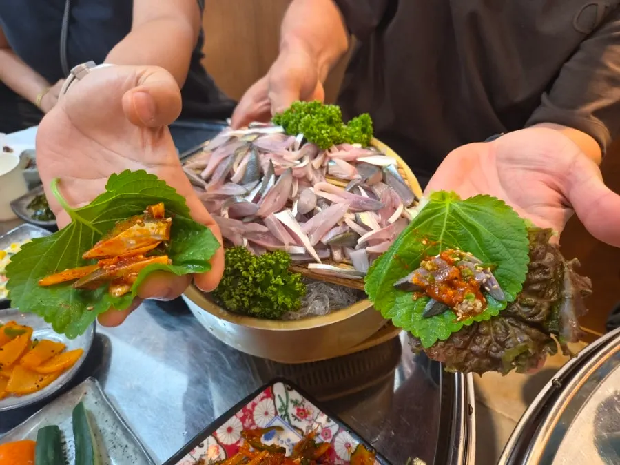 Gizzard shad set and steamed crab together on the table