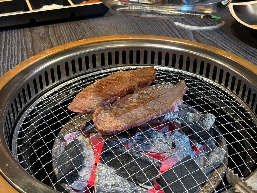 Hanwoo cooking over charcoal
