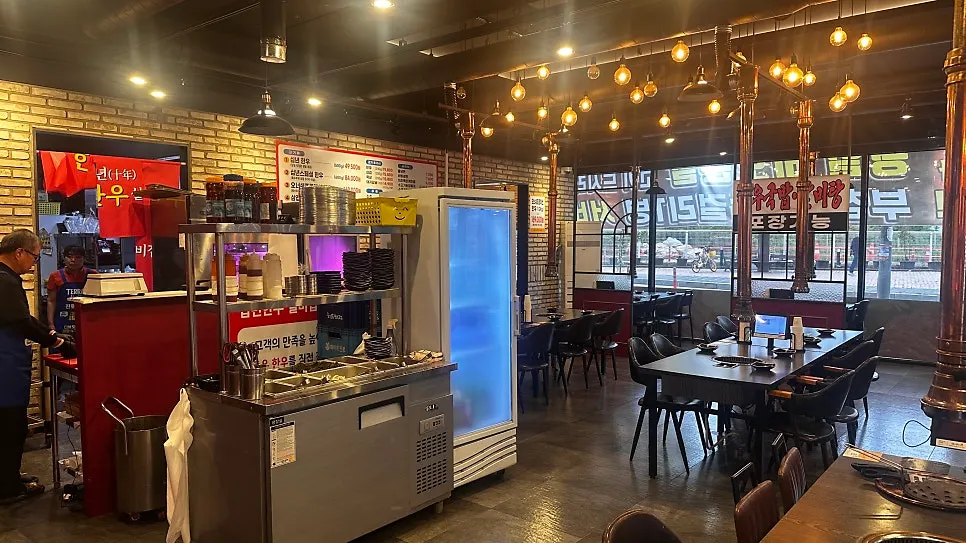 Interior with charcoal grill tables