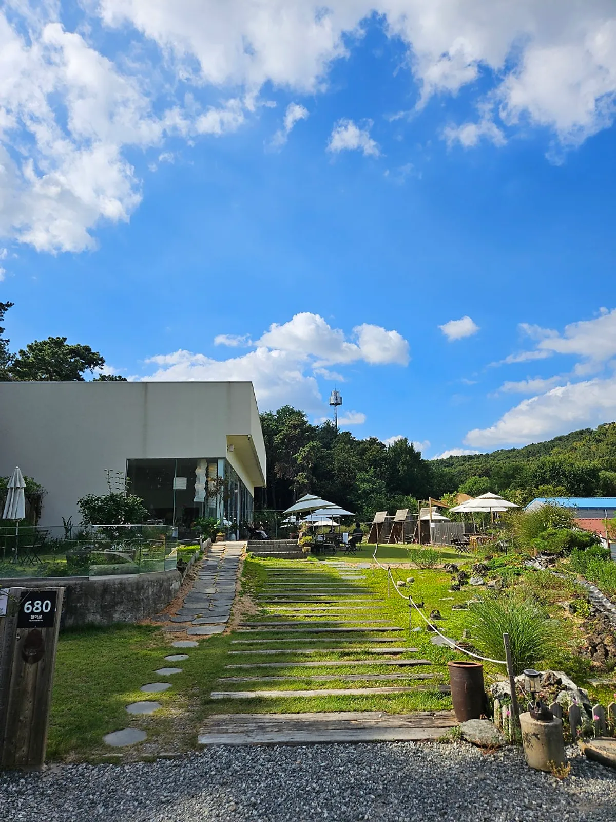 View of the seating at Sisup with the forest visible