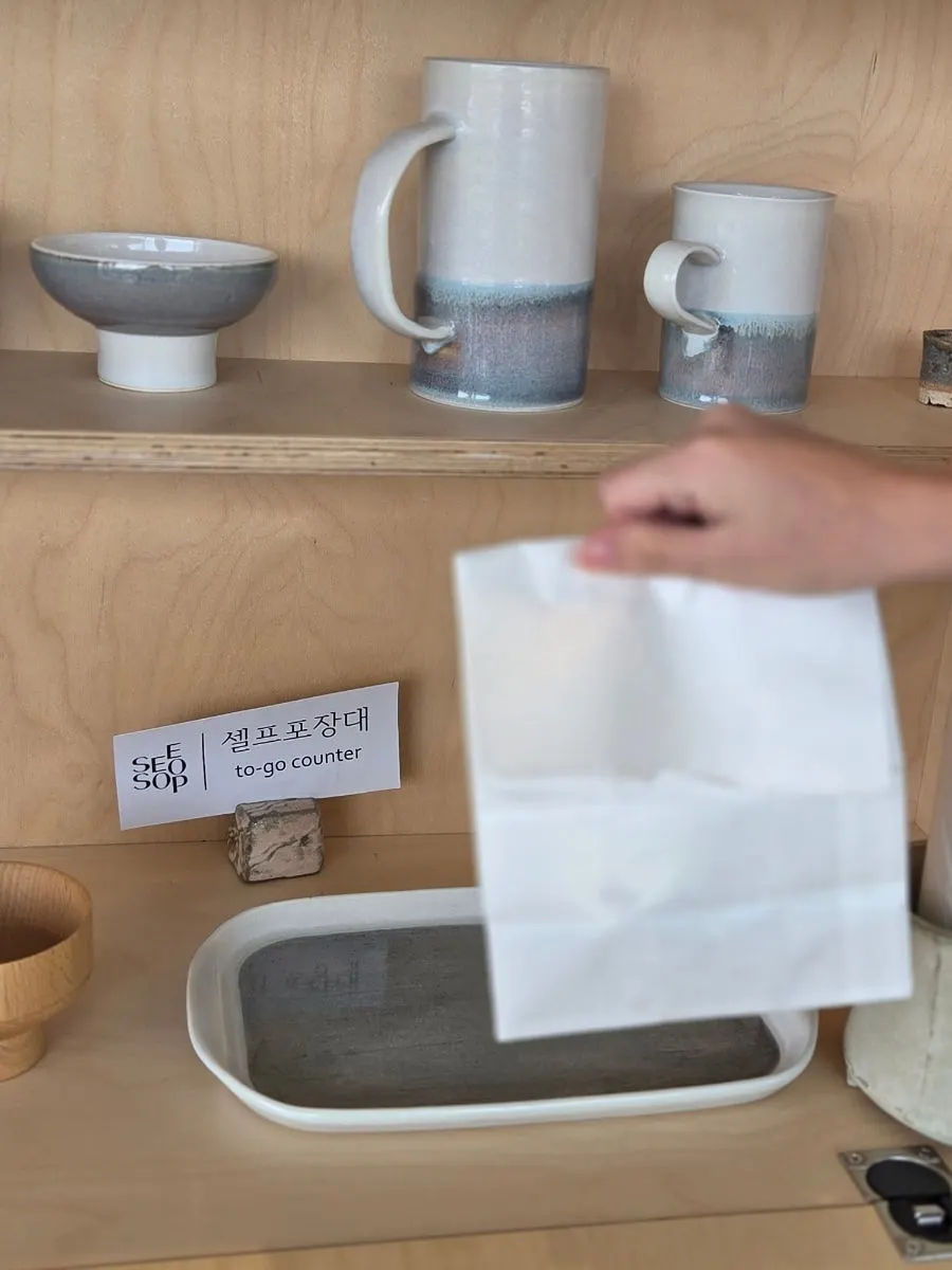 Sisup takeout drink with an unusual cup holder