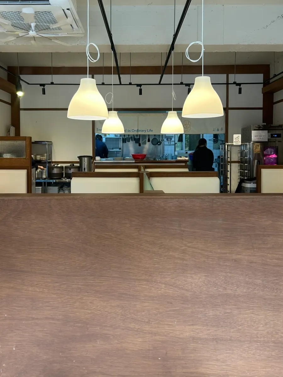 Interior of Sioldon Ilwon Branch in wood tones and ivory colors