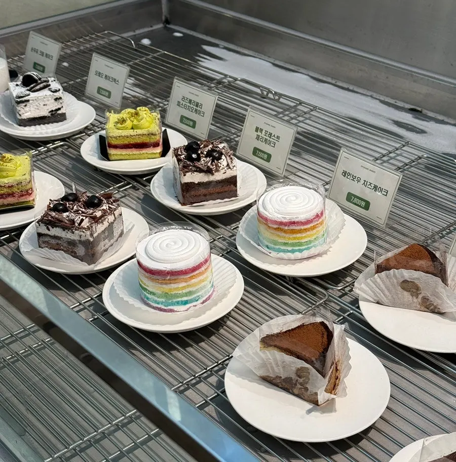 Cake showcase with rainbow cheesecake