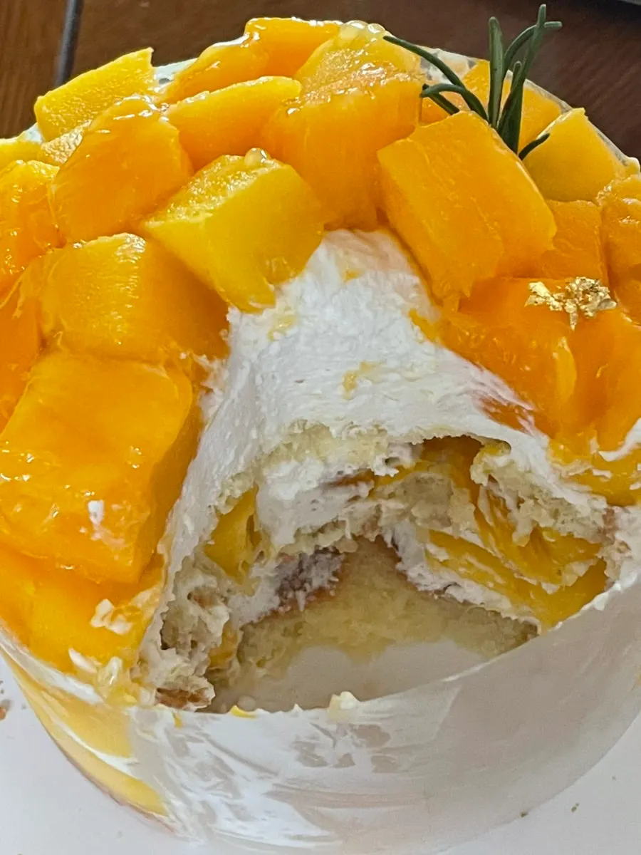 Cross-section of the mini cake showing mango filled inside