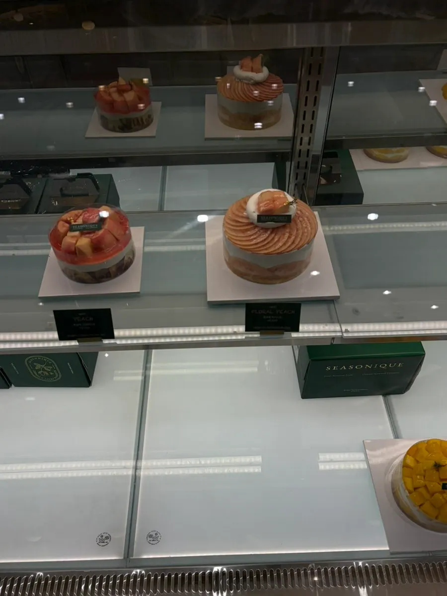 Display case with only a few cakes left on Sunday evening