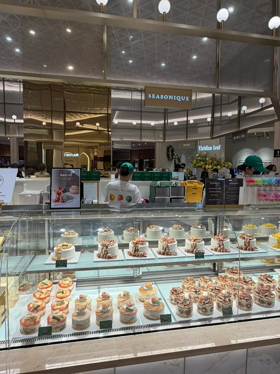 View of the Siznique storefront on the basement floor of Shinsegae Department Store Daegu