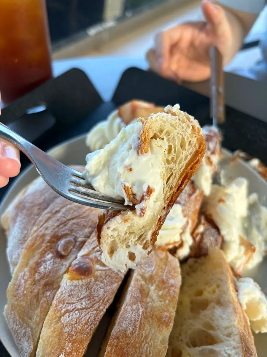 Bread and coffee on an outdoor table