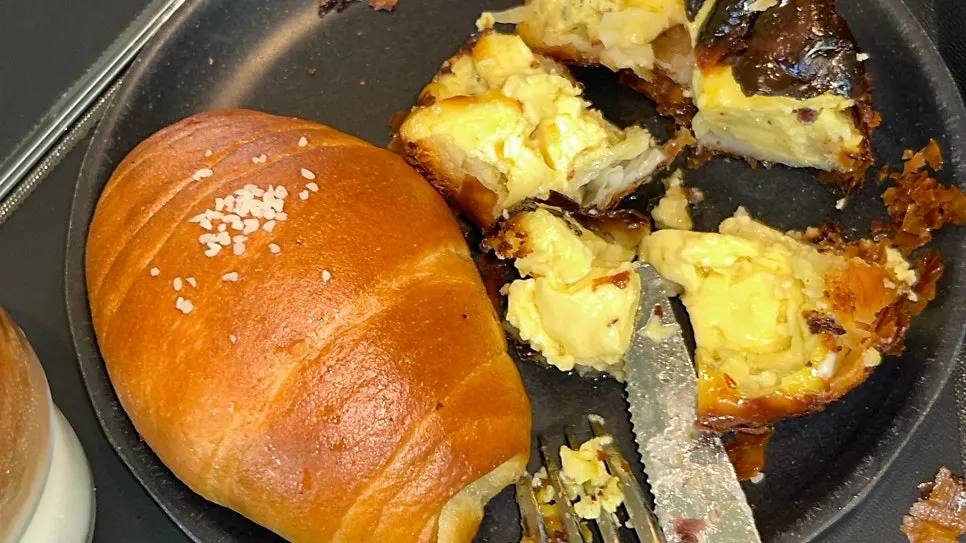 Plate of salt bread and egg tart