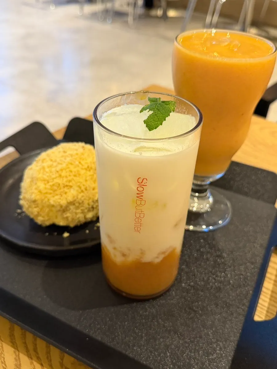 A glass of apricot-filled smoothie