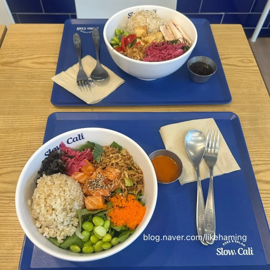 Salmon poke and tofu poke set out on the table