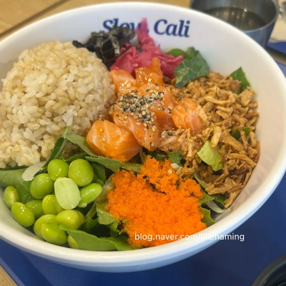 Bowl of salmon poke over brown rice