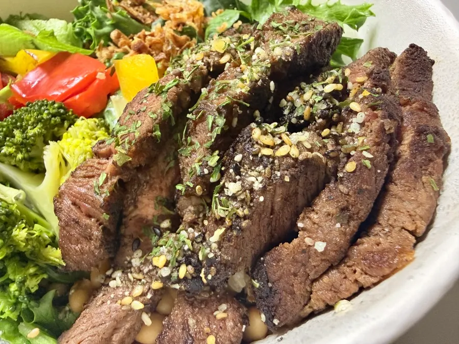 Steak bowl piled high with hanger steak