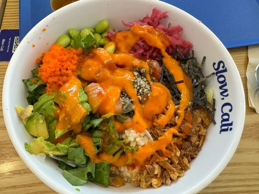 Salmon poke topped with spicy mayo sauce