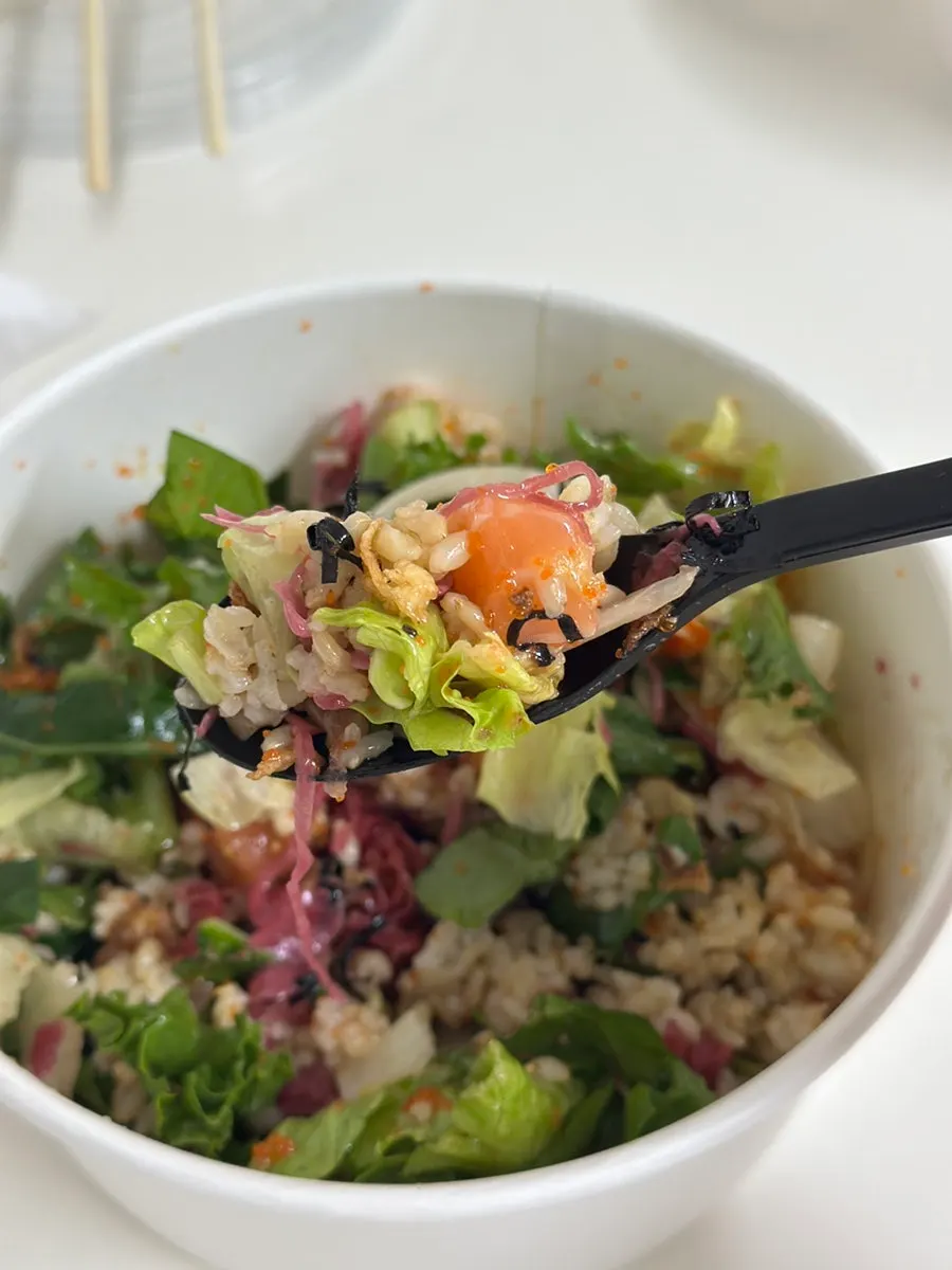 Salmon poke with all ingredients mixed together