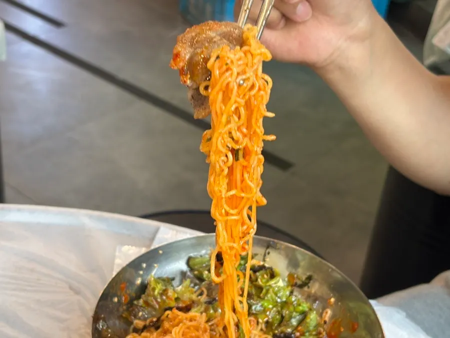 Mixed, chewy bibimmyeon noodles
