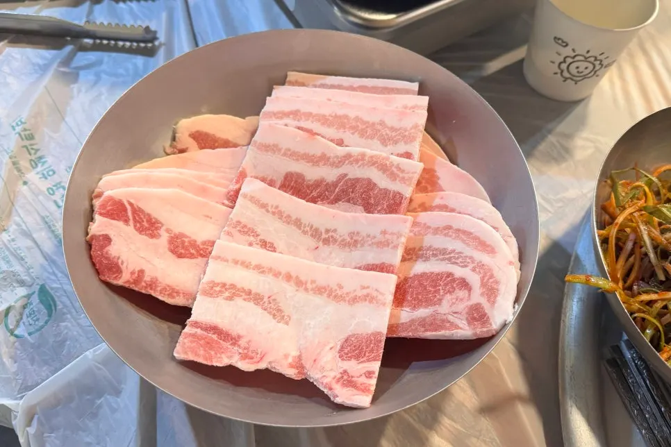 Plate of ordered frozen pork belly