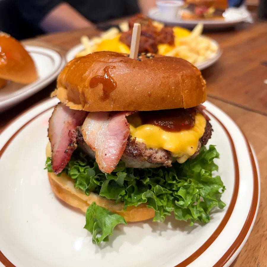 Three ordered handmade burgers and chili cheese fries