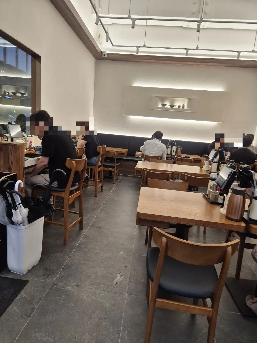 Warm wood-toned interior of the Japanese restaurant