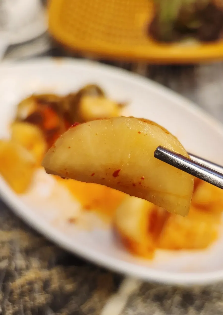 Crisp, well-fermented radish kimchi side dish