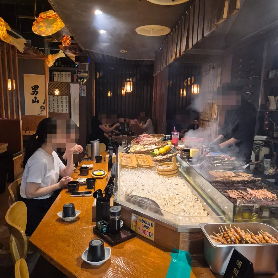 Wood-tone interior of izakaya Sodam