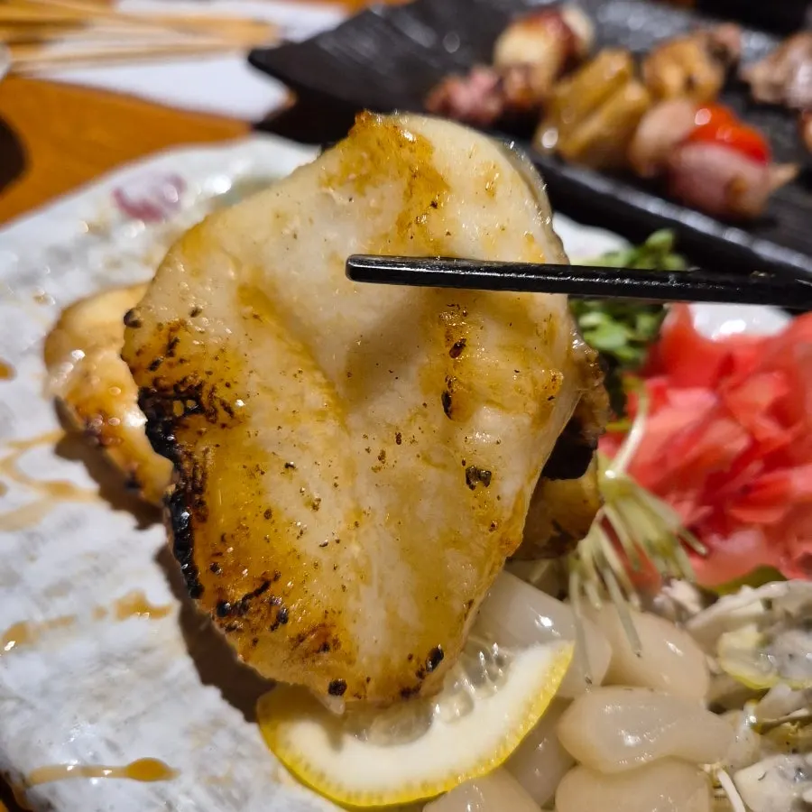 Moist, tender flesh of the grilled sea bass