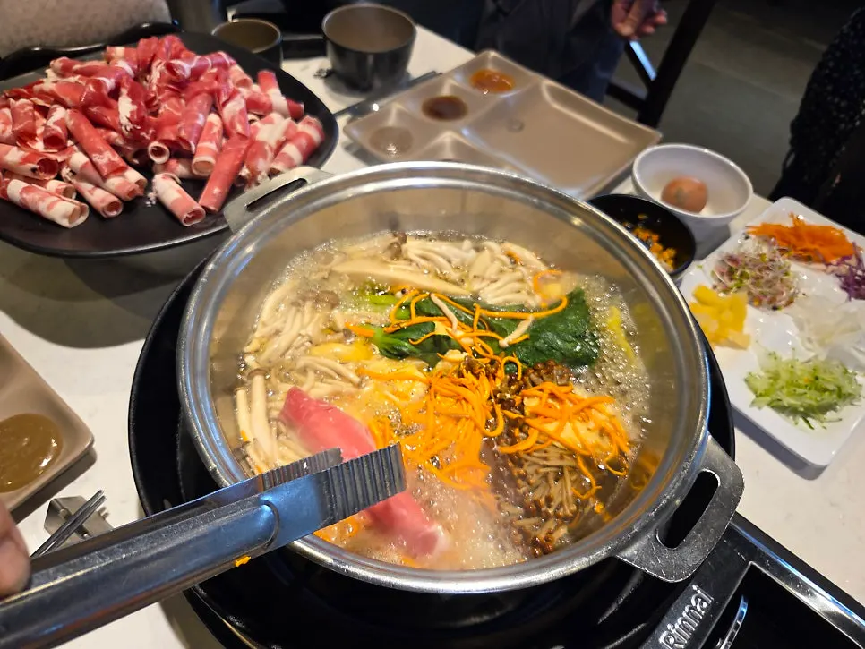 Hearty spread of shabu shabu on the table