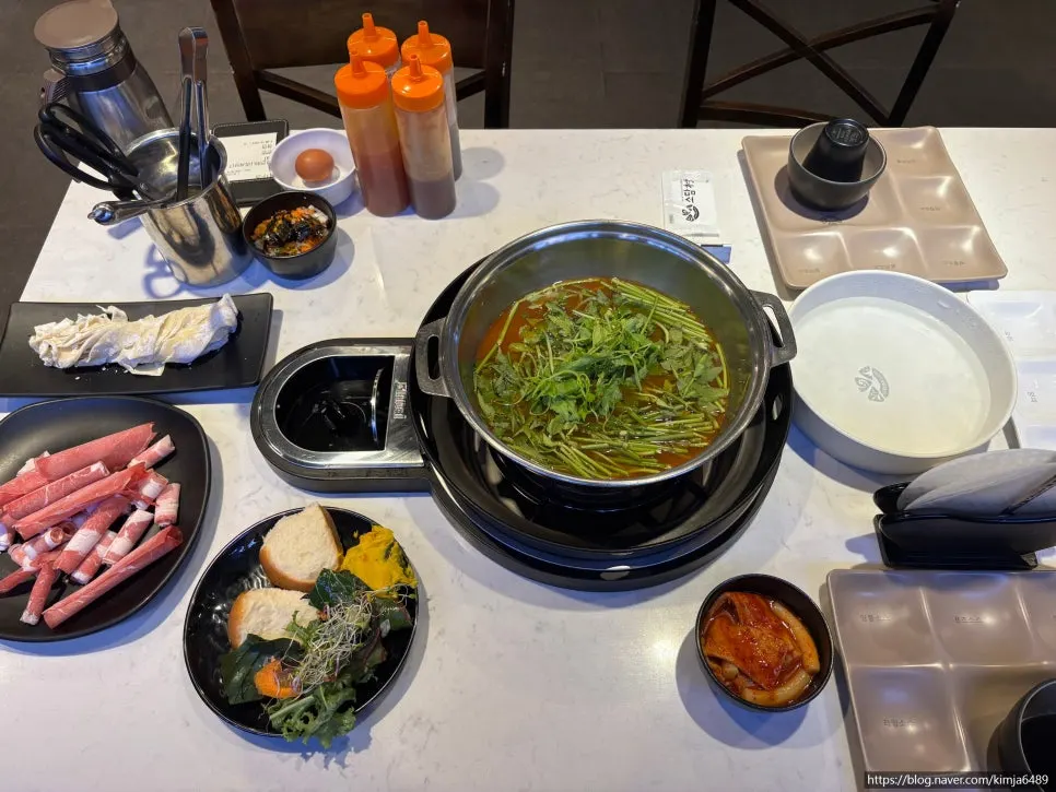 Table setup for the spicy minari shabu for two