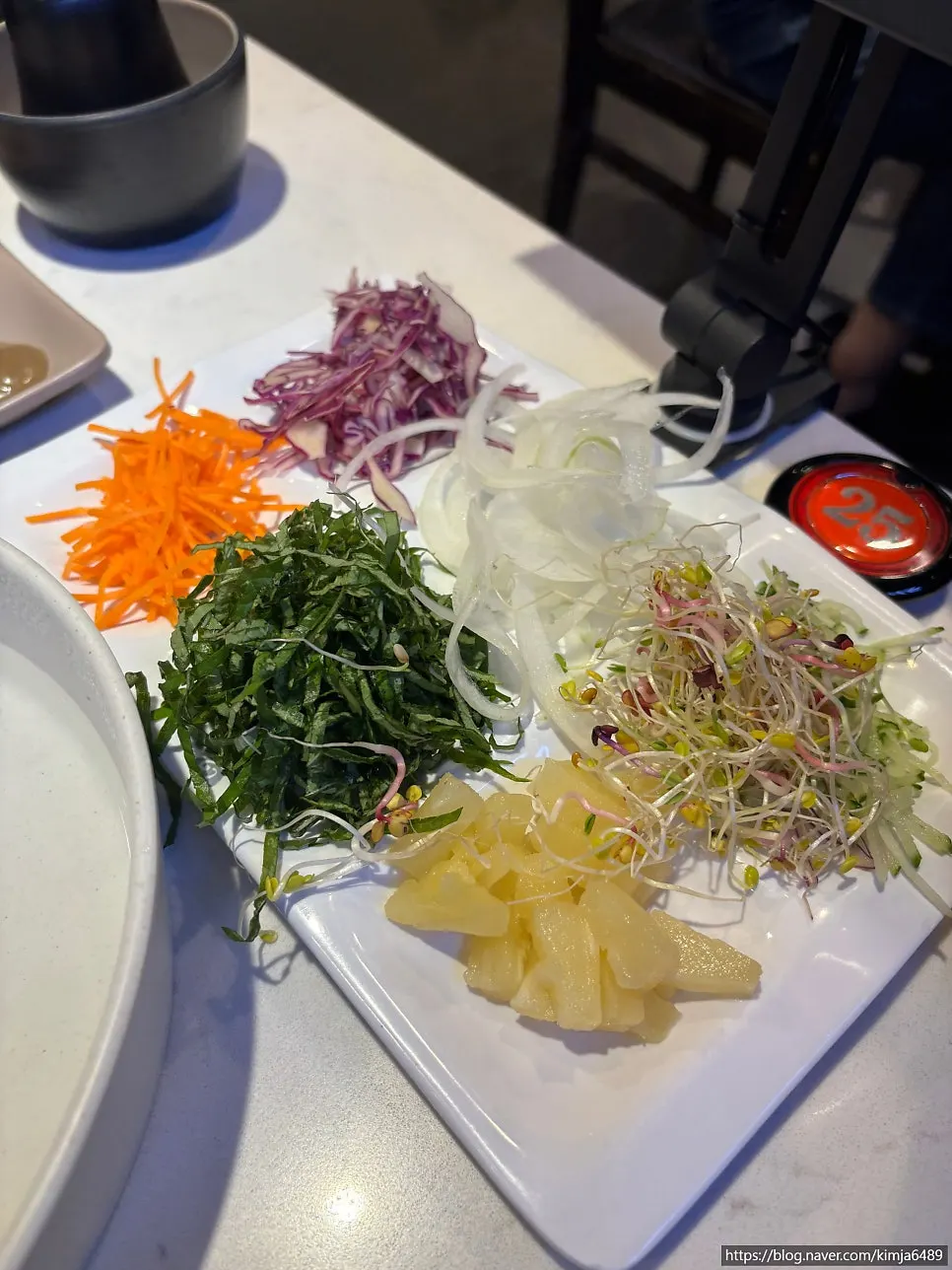 Sodamchon's dipping plate with sauce names labeled