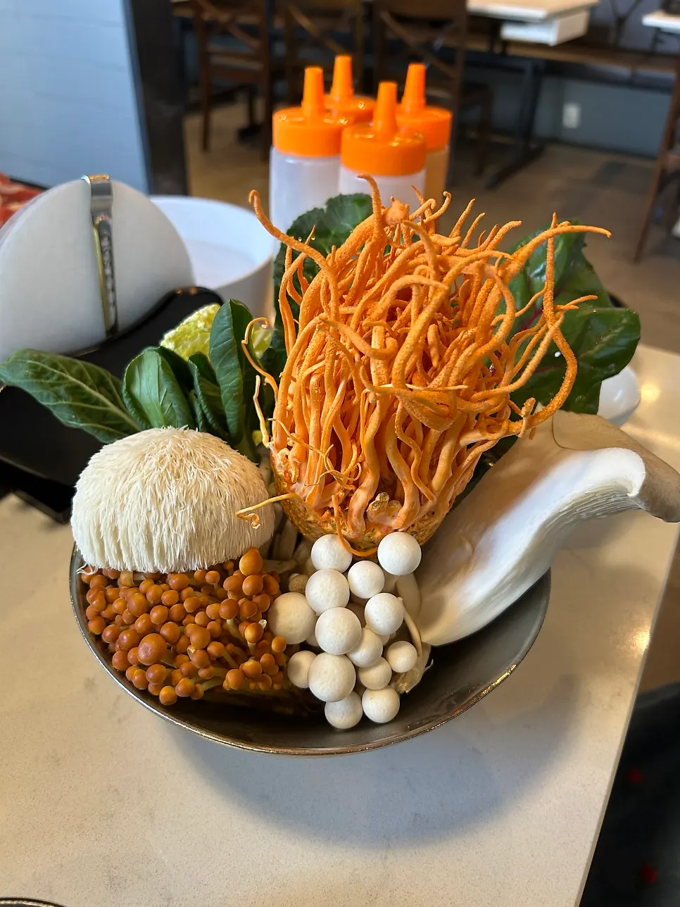 A generous full spread of mushroom shabu shabu