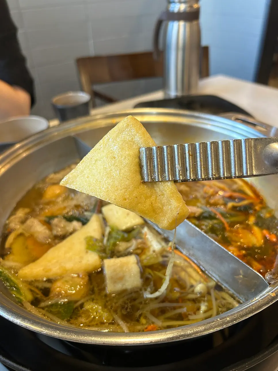 Shabu shabu with fried tofu, fish cakes, and sweet pumpkin added