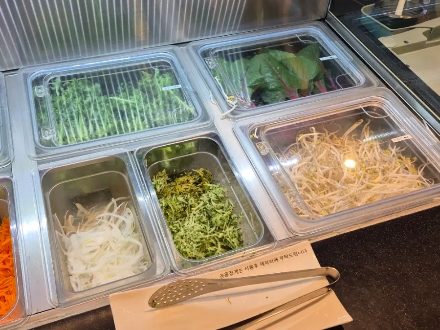 Display of fresh ingredients on the salad bar
