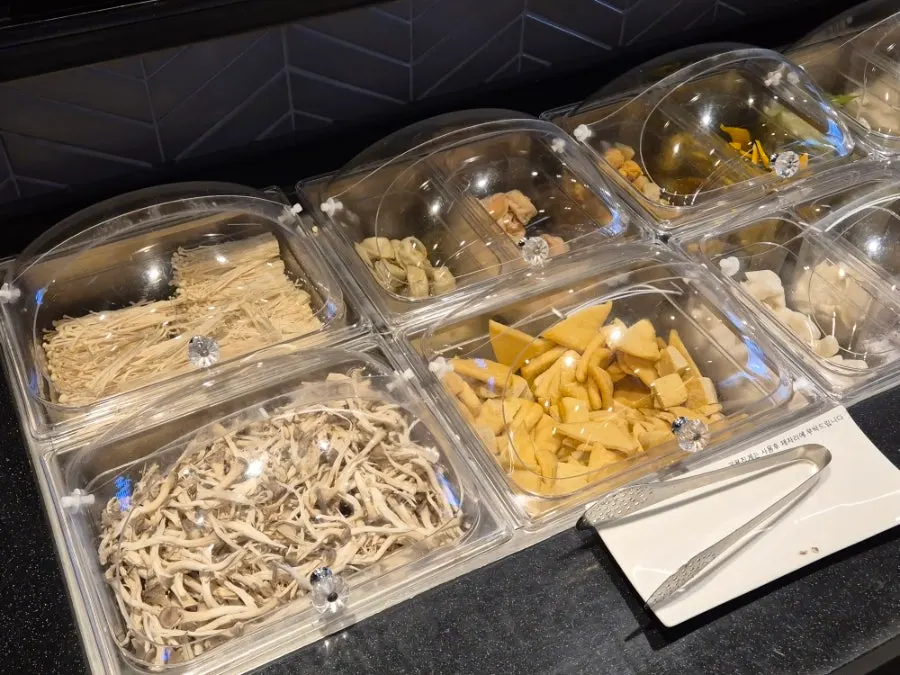 Mushroom, fried tofu, rice cake, and mandu corner for shabu-shabu