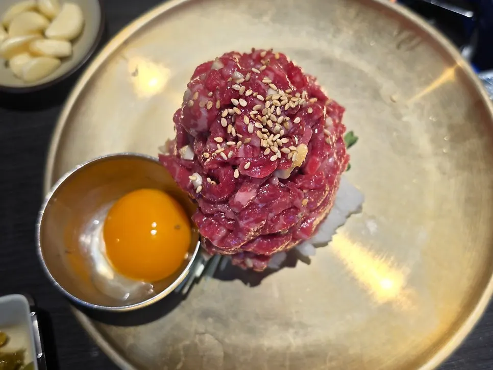 A bite of lightly seasoned beef tartare