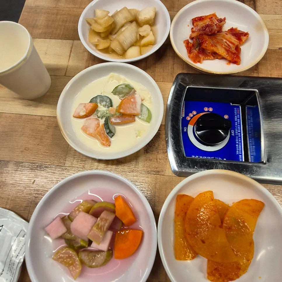Cheonan chicken stew with ramen noodles and flat mandu after extra broth was added, Sottture