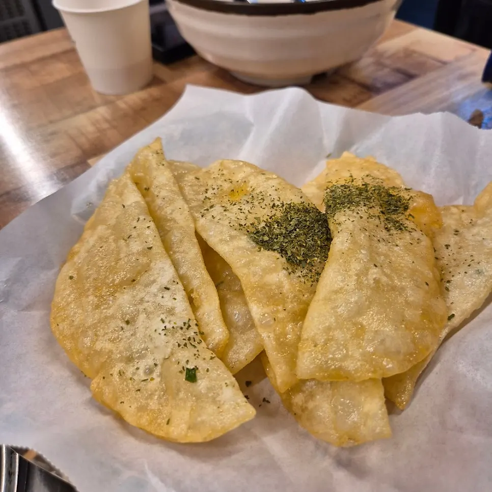A plate of crispy-fried flat mandu