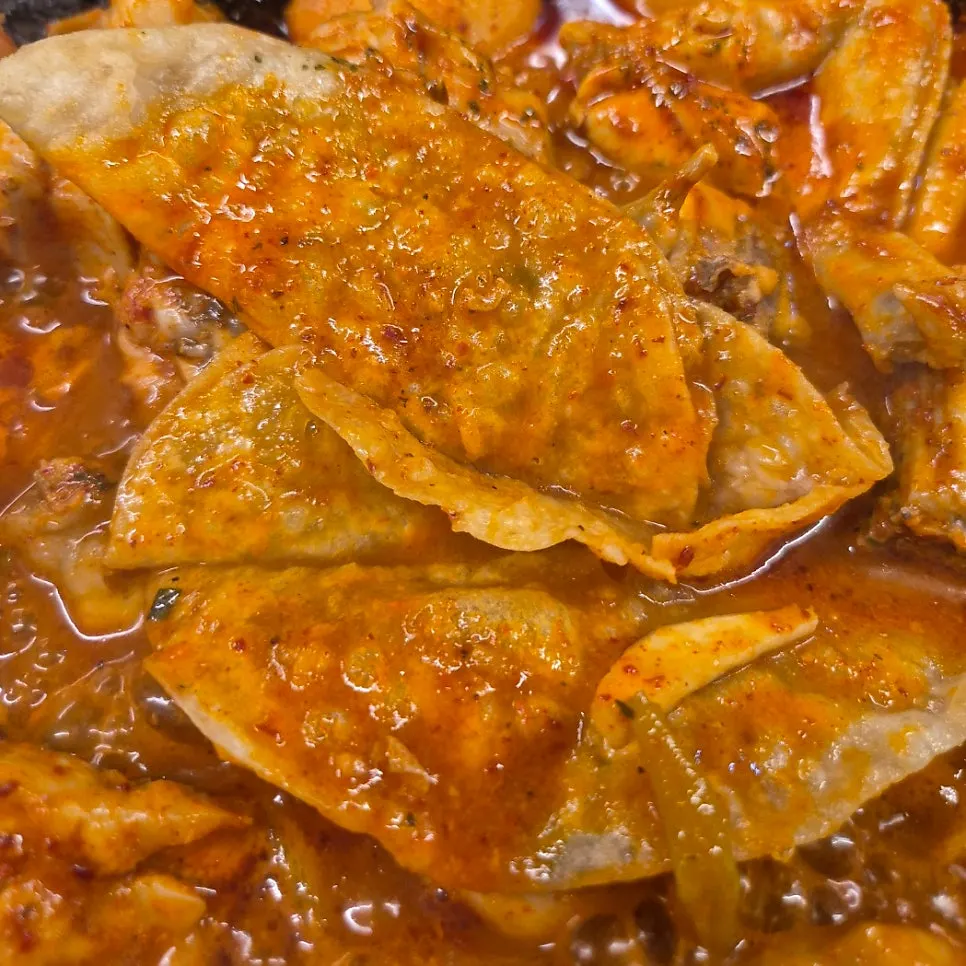 Flat mandu dipped in dakdoritang broth