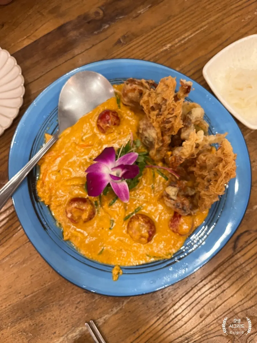Table spread of Thai dishes at Soi Nana Seongsu