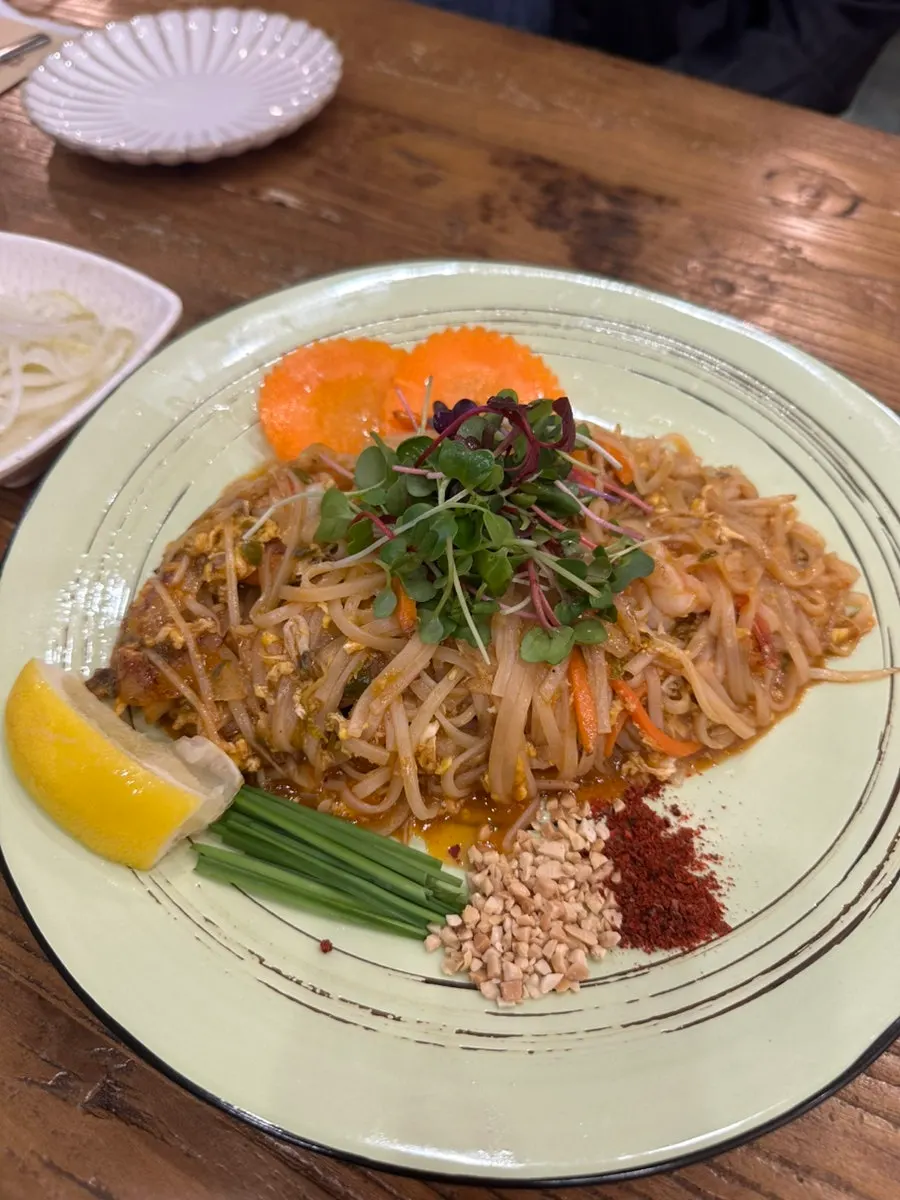 Full spread of three Thai dishes at Soi Nana