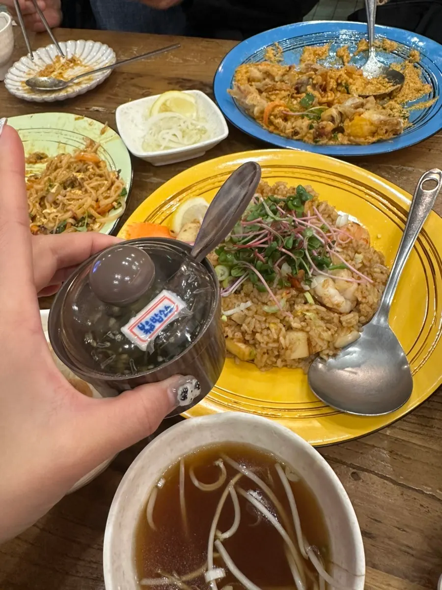 Full-size bowl of pho broth provided by the restaurant