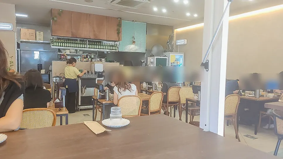 Interior view of Soi Nana Seongsu decorated with plants
