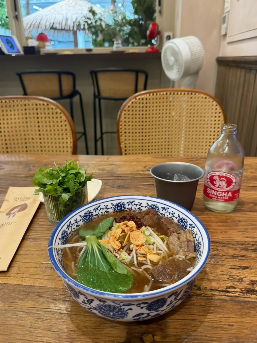 Close-up of rice noodles and beef shank