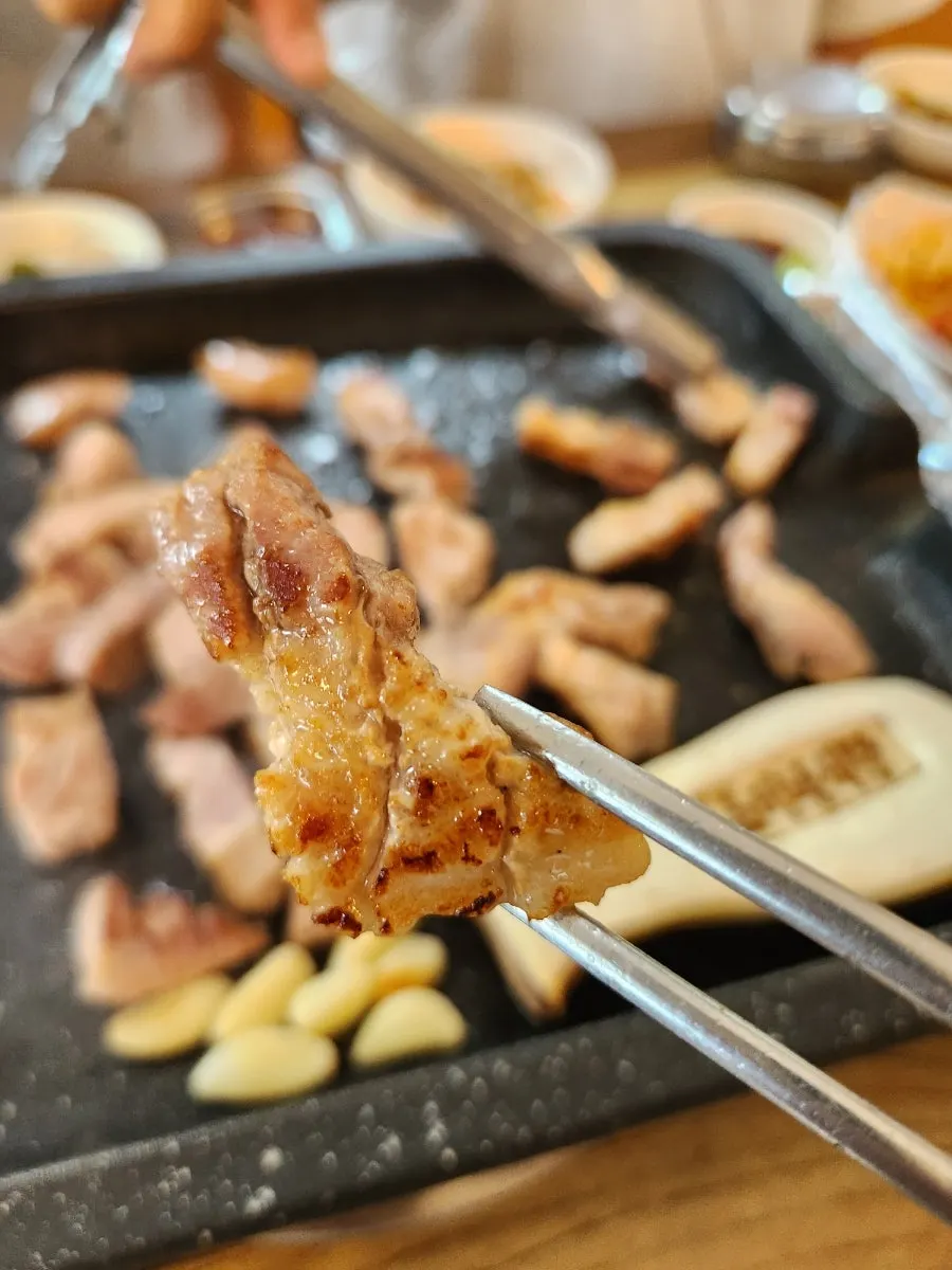 Combo platter meat grilling on the pan