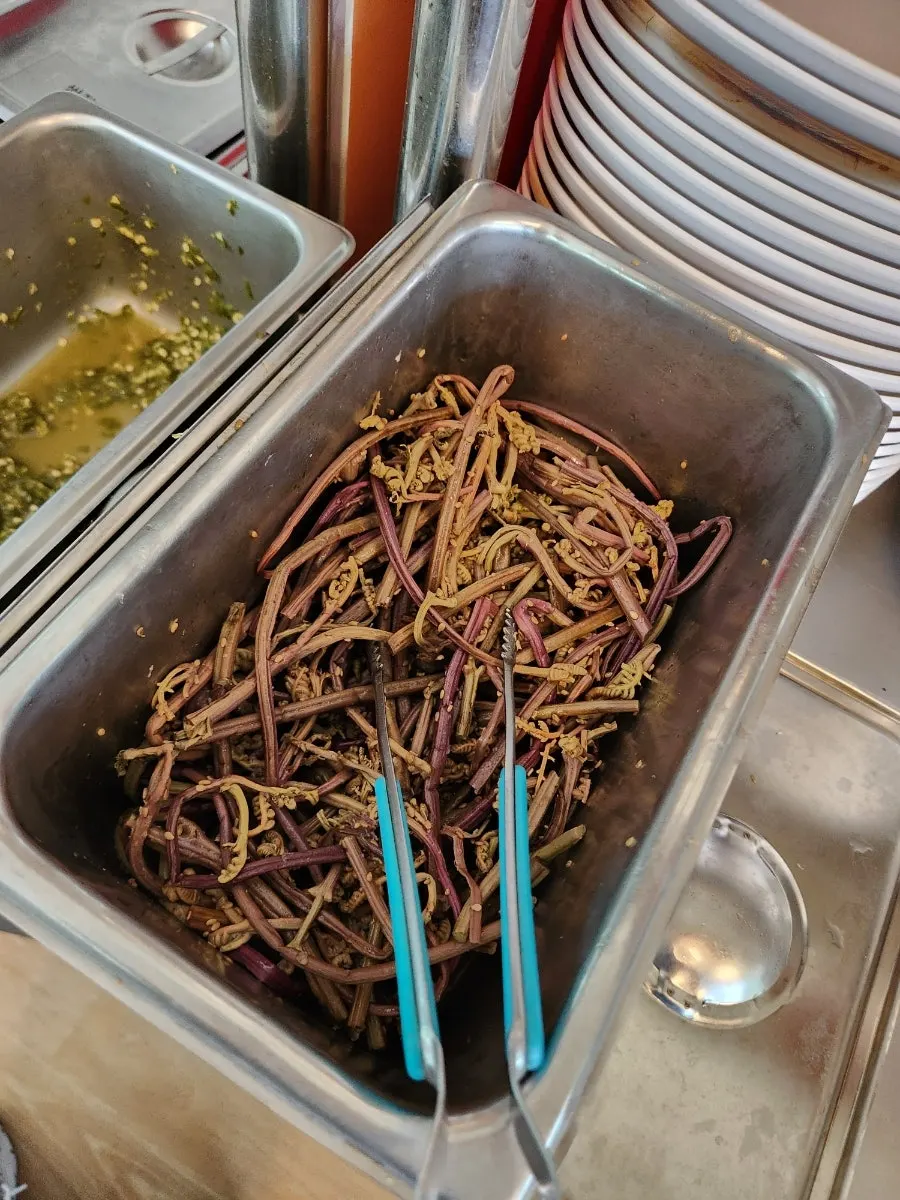 Bracken fern side dish at the self-serve bar