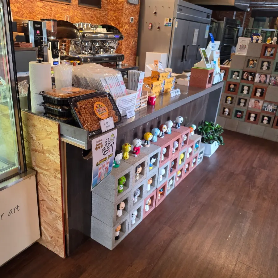 Counter area displaying potato bread and Sokcho Jjonddeugi