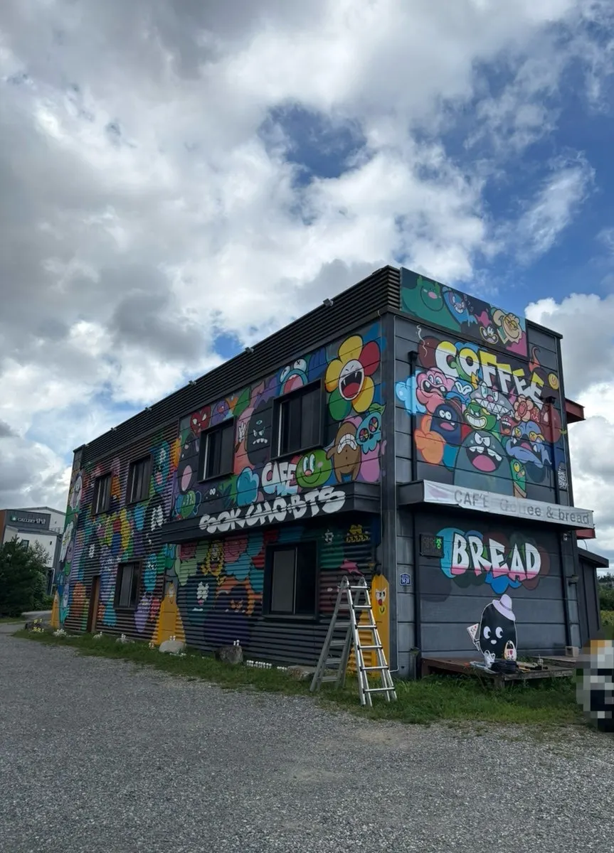 Store exterior painted with potato bread characters