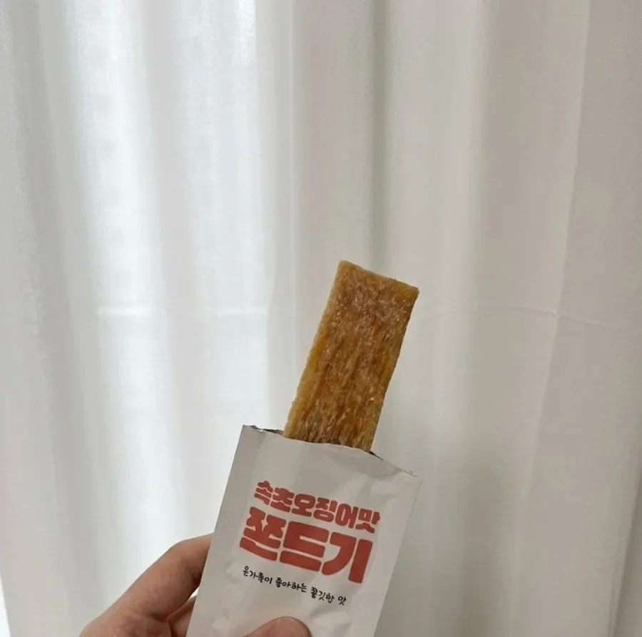 Potato bread microwaved and split in half showing the inside