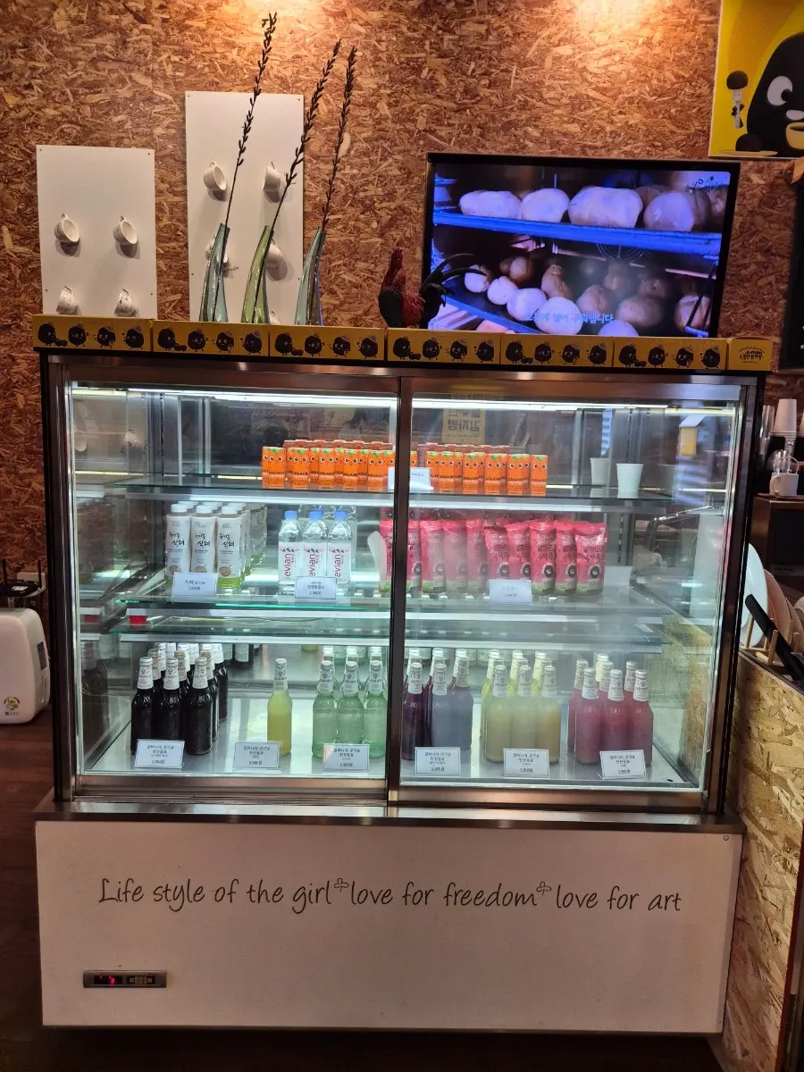 Store interior with wood-tone lighting